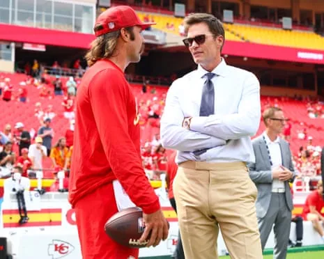 The NFL legend ignites online backlash as being spotted in Raiders coaching booth